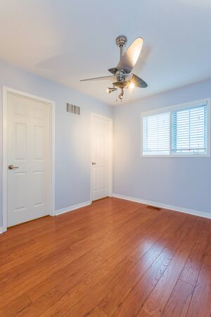 Empty Master Bedroom after renovation in a New Townhouseの写真素材