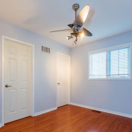Empty Master Bedroom after renovation in a New Townhouseの写真素材