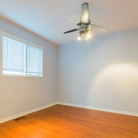 Empty Master Bedroom after renovation in a New Townhouseの写真素材
