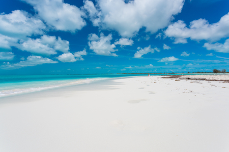 Tropical beach background with white sand beach and soft blur seaの写真素材