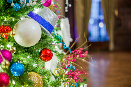 Christmas tree with Christmas decorations in the hallの写真素材