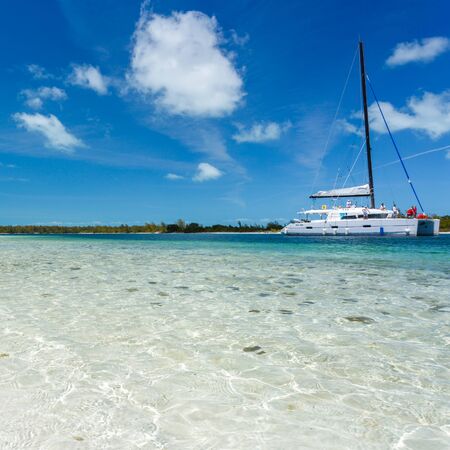 Catamaran at the tropical beach of Cubaの写真素材