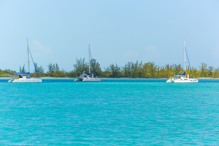 Three Catamarans at the tropical beach of Cubaの写真素材