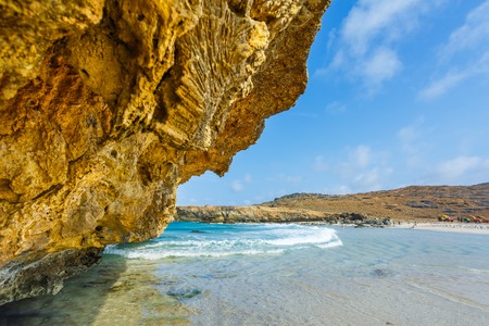 Big  rock on the beach of Arubaの写真素材