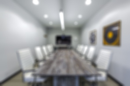 Abstract blurred background of conference room interior, shallow depth of focus.の写真素材