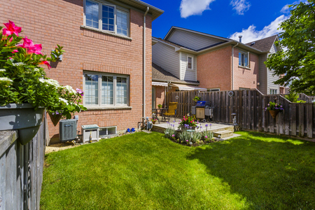 Backyard garden of custom built luxury house in the suburbs of Toronto, Canada.の写真素材