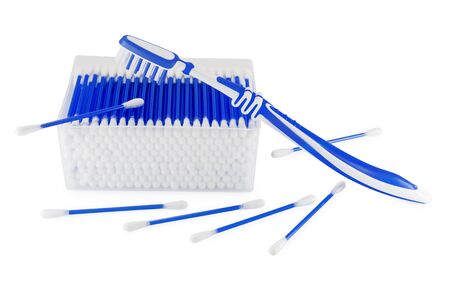 cotton swabs isolated on white background with a toothbrush close-upの写真素材