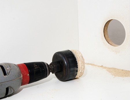 Drilling of large diameter holes hand drill, close-up, carpentryの写真素材