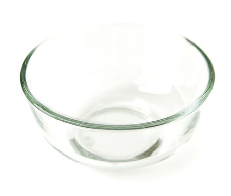 Empty the bowl of glass, isolated on a white background closeupの写真素材