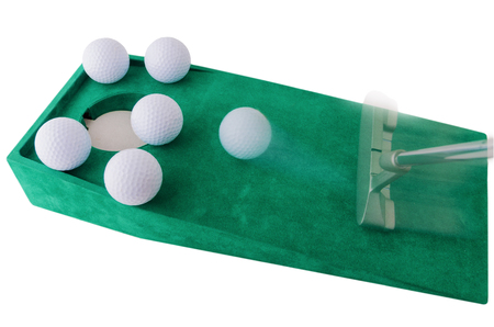 indoor mini golf, ball pocket and putter on green clothの写真素材