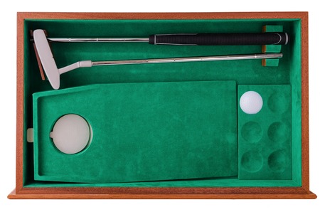 indoor mini golf, ball pocket and putter on green clothの写真素材