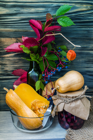Fall Still Life with Pumpkins, cornucopia and fresh fruits. Vertical Composition.の写真素材