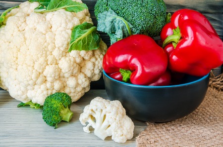 broccoli, pepper and other vegetables closeup on wooden backgroundの写真素材