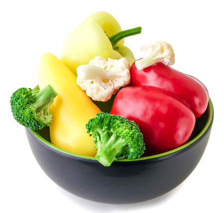 Composition with variety of fresh organic vegetables isolated on whiteの写真素材