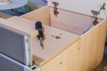 Assembling and installation of kitchen hoods in furnitureの写真素材
