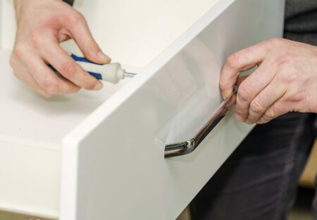 Bonding and assembly of furniture on the wooden pinsの写真素材