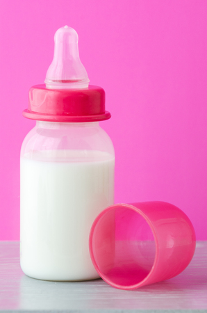 Bottle of baby milk and nippleの写真素材