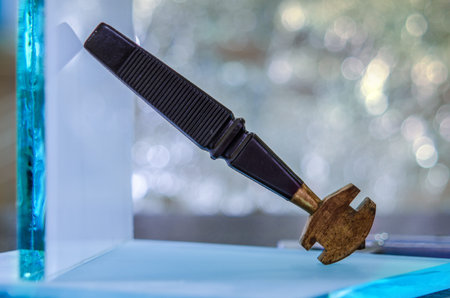 glass and glass cutter closeup on wooden background