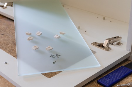 Glass on the furniture facade is mounted with glass clipsの写真素材