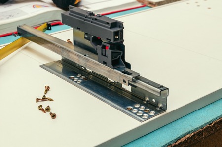 Assembly of furniture, marking and installation of guides for the drawer.の写真素材