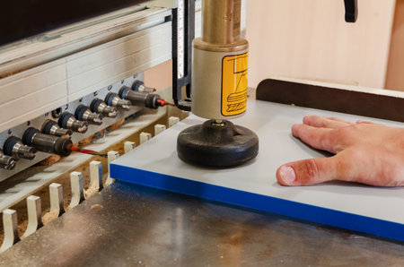 Close-up drilling machine, furniture production, drilling holes in furniture blanks