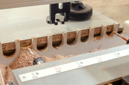 Close-up drilling machine, furniture production, drilling holes in furniture blanks close-up