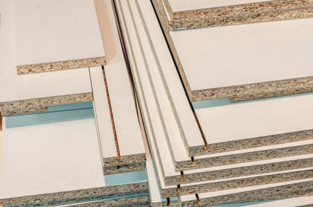 board chipboard cut parts for furniture production close-upの写真素材