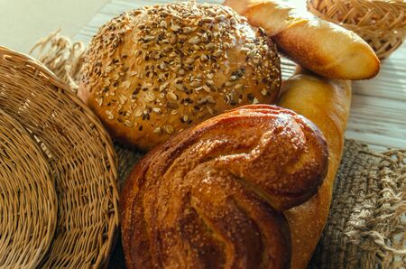 rustic homemade cakes, closeup on wooden background and burlapの写真素材