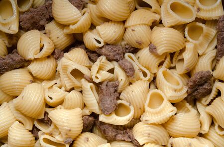 pasta horns cooked with pork meat, close-up, top viewの写真素材