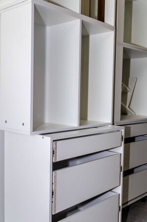 Assembly of hard furniture, close-up drawers for drawersの写真素材