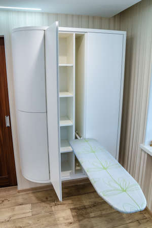 Modern furniture in a minimalist design executed in white color in a home interior.の写真素材