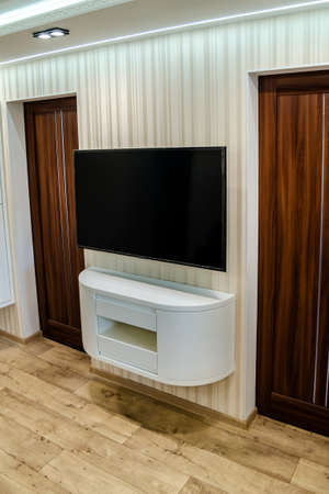 Modern furniture in a minimalist design executed in white color in a home interior.の写真素材