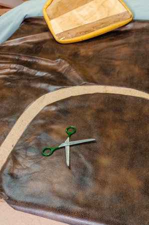 Banner of old worn-out furniture, in the workshop, working process, close-up