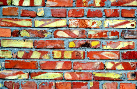Background of red brick wall pattern texture. Great for graffiti inscriptions.の写真素材
