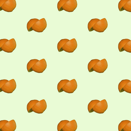 Orange citrus fruit collection and creative pattern isolated on light pastel green background....