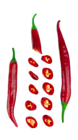 Red hot chopped chili peppers on white background. top view.の写真素材