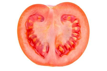 Piece of cut fresh tomato isolated on a white background. top viewの写真素材