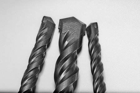 drill bits for perforator close-up on a white background