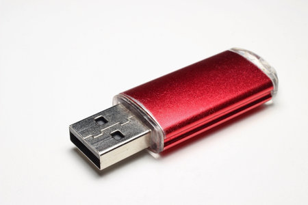 flash drive red on white background closeup