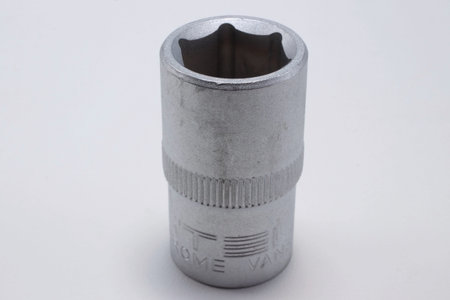 head wrench socket for nuts on a white background close-up
