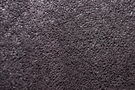 Close up of a black leather texture. Abstract background for design.