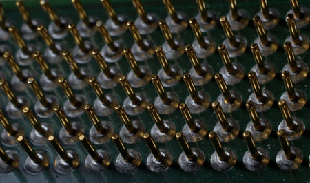 gold plated contacts of a computer chip close up