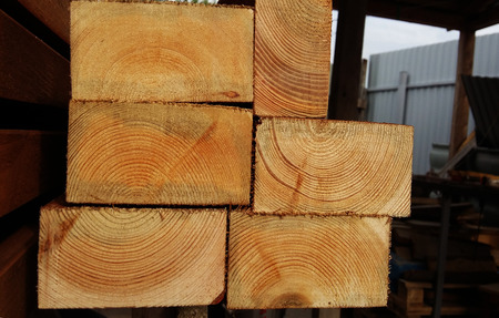 Background ends of the boards. The ends of the lumber. Pine ends. Wood background. Wood textureの写真素材