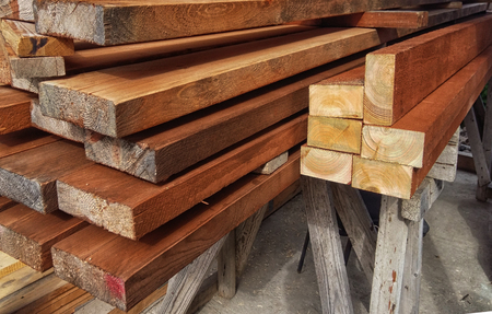 Background ends of the boards. The ends of the lumber. Pine ends. Wood background. Wood textureの写真素材