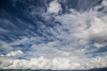 tops of mountains with beautiful clouds