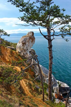 Rock of the freakish form on lakeshore Baikal, on island Olkhonの写真素材