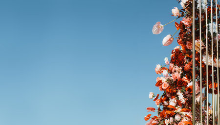 red flowers against blue sky, Ready layout for text message or content. Holiday card, copy space ..