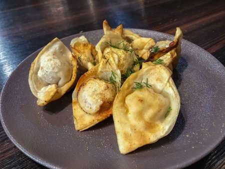 Fried Dumplings stuffed with meat, sprinkled with chopped dill, ..の写真素材