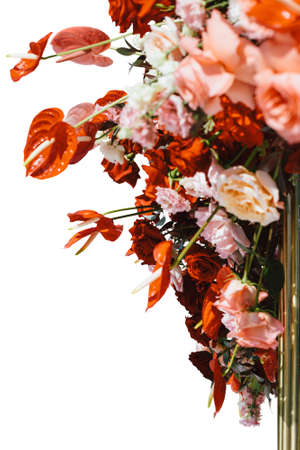 luxurious wedding arch on the river bank decorated with fresh flowers, wedding background, wedding, beautiful sunny summer dayの写真素材