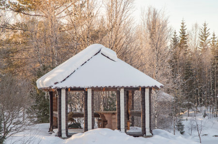 Minimalist winter landscape with wooden house in snowy mountains. landscape photography.の写真素材